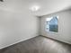 Bedroom with a bright window at 3142 Britannia Blvd # C, Kissimmee, FL 34747