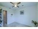 Neutral bedroom featuring carpet, adjacent hall access, and natural light at 322 Annabelle Way, Davenport, FL 33837