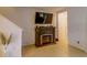 Living area with a modern fireplace and tiled flooring at 322 Annabelle Way, Davenport, FL 33837