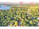 Stunning aerial view showcasing the property's proximity to Lake Brantley and local schools at 3325 Horseshoe Dr, Longwood, FL 32779