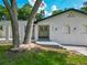 Close up of a home's front entrance with a double door and stucco facade at 3325 Horseshoe Dr, Longwood, FL 32779