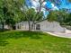 Charming single-story home with stucco siding and a well-manicured front lawn at 3325 Horseshoe Dr, Longwood, FL 32779