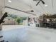 Spacious garage features an open layout, bike storage, a work bench and a treadmill at 3325 Horseshoe Dr, Longwood, FL 32779