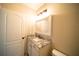 Bathroom featuring a granite countertop vanity and ample lighting at 338 Roberts Family Ln, Winter Springs, FL 32708