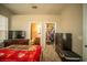 Well-lit bedroom showcasing a comfortable bed, closet, and en-suite bathroom providing convenience and privacy at 338 Roberts Family Ln, Winter Springs, FL 32708