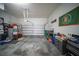 Spacious two-car garage with ample room for parking, storage, and various activities at 338 Roberts Family Ln, Winter Springs, FL 32708