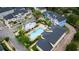 An aerial view of a beautiful community pool, jacuzzi, and surrounding residences at 338 Roberts Family Ln, Winter Springs, FL 32708