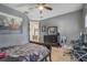Bedroom featuring neutral carpet, ceiling fan, and view to a hall and living room at 3656 Heirloom Rose Pl, Oviedo, FL 32766