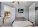 Bedroom boasts neutral decor, carpet flooring, and ensuite access, creating a comfortable, private space at 3656 Heirloom Rose Pl, Oviedo, FL 32766