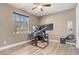 This office space is well lit by a natural light window and features a multi monitor computer setup at 3656 Heirloom Rose Pl, Oviedo, FL 32766
