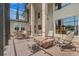 Enclosed outdoor patio with brick floors, multiple seating areas, and fire pit at 3656 Heirloom Rose Pl, Oviedo, FL 32766