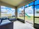 Relax on the screened porch overlooking the spacious yard with boat and play equipment at 3980 Gadwall Pl, Leesburg, FL 34748