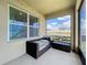 Comfortable screened patio with lounge seating provides the perfect backyard view at 3980 Gadwall Pl, Leesburg, FL 34748