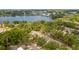 Community aerial view featuring beautiful tree coverage and lake views at 411 Meadowood Blvd, Fern Park, FL 32730