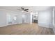 Large bedroom with ceiling fan, French doors, and attached bathroom at 411 Meadowood Blvd, Fern Park, FL 32730