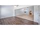 Split level open concept living room and dining room area featuring two different flooring types at 411 Meadowood Blvd, Fern Park, FL 32730