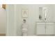 Well-lit bathroom featuring a toilet and vanity, offering a clean and functional space at 4343 Curacao Pl, Kissimmee, FL 34758