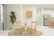 Cozy dining area with a round table, seating for four, and lots of natural light at 4343 Curacao Pl, Kissimmee, FL 34758