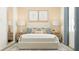 Serene main bedroom with a cozy bed, decorative pillows, and soft lighting for a relaxing retreat at 4343 Curacao Pl, Kissimmee, FL 34758