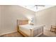 Relaxing bedroom with neutral walls, a simple bed frame, and soft natural light at 5203 Jasmine Trace Ln, Kissimmee, FL 34758