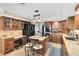 Updated kitchen boasts granite countertops, stainless steel appliances, and ample cabinet space at 556 Lake Ave, Altamonte Springs, FL 32701