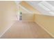 Cozy loft space with neutral carpet and a skylight at 6052 Westgate Dr # 204, Orlando, FL 32835