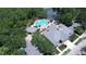 Aerial view showing a neighborhood community pool and other amenities at 6333 Schoolhouse Pond Rd, Winter Garden, FL 34787