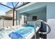Relax in this luxurious hot tub on the screened in lanai at 6333 Schoolhouse Pond Rd, Winter Garden, FL 34787
