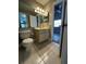 A half bath with a toilet and single sink vanity at 652 Roaring Dr # 234, Altamonte Springs, FL 32714