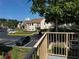 Balcony view of the community, landscaping, and nearby residential buildings on a clear day at 652 Roaring Dr # 234, Altamonte Springs, FL 32714