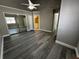 The main bedroom features a ceiling fan, ensuite bathroom, and a large closet with floor to ceiling mirrors at 652 Roaring Dr # 234, Altamonte Springs, FL 32714