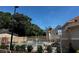 Community pool with ample seating for residents and guests, surrounded by lush landscaping at 652 Roaring Dr # 234, Altamonte Springs, FL 32714