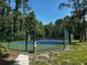 Well-maintained community tennis court, surrounded by lush greenery for added privacy at 652 Roaring Dr # 234, Altamonte Springs, FL 32714