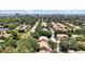 An aerial view of houses within a wooded community in a city at 7521 Bay Port Rd # 12, Orlando, FL 32819
