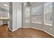 Corner breakfast nook area bathed in natural light from multiple windows at 7521 Bay Port Rd # 12, Orlando, FL 32819