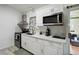 Updated kitchen featuring white cabinetry, stainless steel appliances, and modern countertops at 8 Lake Jackson Dr, Mascotte, FL 34753