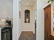 Hallway between the kitchen and other rooms in the house at 809 Palmetto Ter, Oviedo, FL 32765
