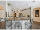 Bright kitchen boasts granite countertops, bar seating and stainless steel appliances at 809 Palmetto Ter, Oviedo, FL 32765