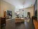 Bright, open living room featuring tile flooring, comfortable seating, and an open concept design at 809 Palmetto Ter, Oviedo, FL 32765