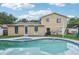 Enjoy the private backyard with a refreshing pool on a sunny day at 8652 Savory Dr, Orlando, FL 32825