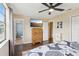 Comfortable bedroom with an en-suite bathroom and scenic outdoor views at 8652 Savory Dr, Orlando, FL 32825