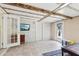 Versatile living space featuring tiled flooring, a TV, and natural light at 8652 Savory Dr, Orlando, FL 32825