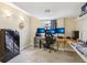 This second home office has modern computer set up and wall-mounted lighting at 8652 Savory Dr, Orlando, FL 32825