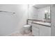 Bathroom featuring vanity with sink, toilet, and tiled floor at 8801 Latrec Ave # 8107, Orlando, FL 32819