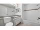 Bathroom showcasing a vanity with sink, toilet, and shower-tub combo at 8801 Latrec Ave # 8107, Orlando, FL 32819