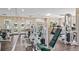 Well-equipped fitness center with modern exercise machines and weights for a comprehensive workout experience at 8801 Latrec Ave # 8107, Orlando, FL 32819