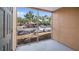 Screened-in patio offers views of the parking lot and the community at 8801 Latrec Ave # 8107, Orlando, FL 32819
