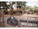 A park with multiple playground structures and slides, perfect for Gathering fun and outdoor activities at 911 S Oak Ave, Sanford, FL 32771
