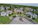 Scenic aerial view of the townhome community, highlighting lush landscaping and water features at 105 Wood Duck Cir # D, Daytona Beach, FL 32119