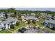 Aerial shot of the townhome community, featuring parking areas and lush green spaces at 105 Wood Duck Cir # D, Daytona Beach, FL 32119